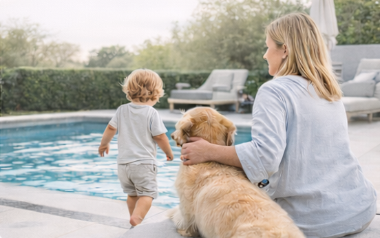 Family with golden retriever beside a pool
